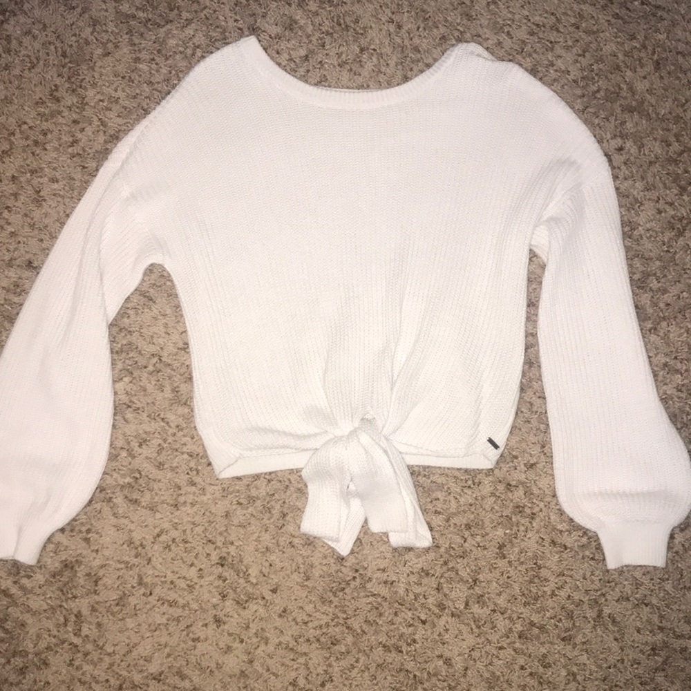 white sweater with bow